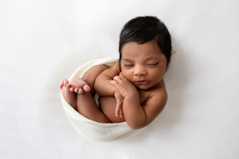 darwin newborn photographer of baby in white natural curl