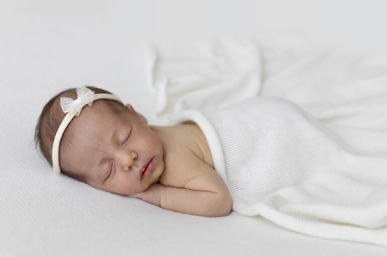 darwin newborn photograph baby sleeping white