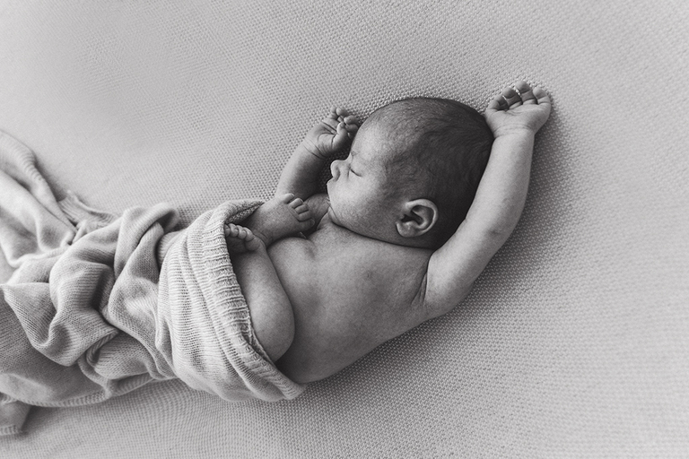 Darwin newborn photography black and white natural posed baby with wrap